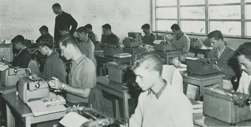 Today, iPads and ETexts have replaced typewriters and textbooks. All students at ACND Prep receive an iPad. Archive photo from Archbishop Curley 1956 yearbook.
