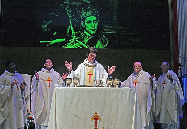 Priests who serve now or have served at St. Louis celebrate the 50th anniversary Mass, from left: Father Biju Vells and Father Fredy Yara, current parochial vicars; Father Paul Vuturo, current pastor; Msgr. James Fetscher, former pastor; and Father Michael Kish, longtime parochial vicar who is now retired.