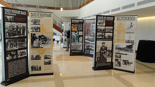 View of "The Courage to Remember" exhibit in the lobby of the Bienes Center for the Arts.