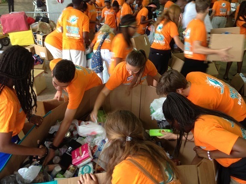 Students helped to sort, pack, and prepare thousands of items to be shipped United States to troops overseas.
