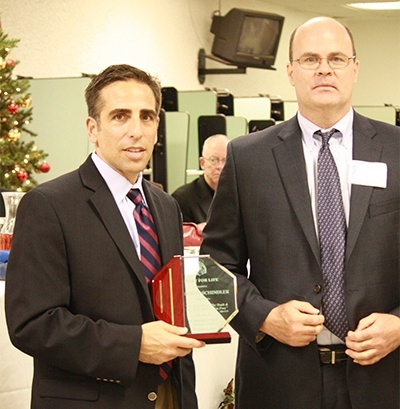 Bobby Schindler receives the annual John Paul II Award from St. Malachy's Mary for Life president, Eugene Cunningham.