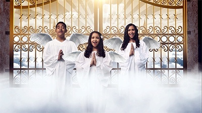 Siblings Santiago and Daniela Orozco, from left, join their cousin Manuela Orozco as angels in the "I Believe" video. They're all friends of the family of Alvaro Vega, who stars in the video.