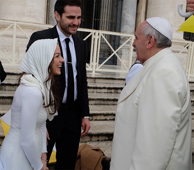 Melissa and Ryan Ulloa during their Spanish-language chat with Pope Francis.