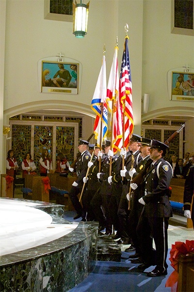 Members of the Fort Lauderdale Police and Fire Department honor guard presented the flags at the Mass of consecration for the City of Fort Lauderdale in St. Anthony Catholic Church.