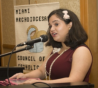 Scholarship recipient and Msgr. Edward Pace High School sophomore Melissa Rey thanks the Miami Archdiocesan Council of Catholic Women for giving her the opportunity to continue her education in a Catholic high school.