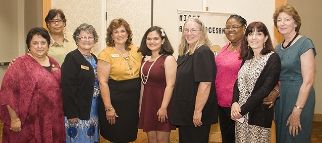 Melissa Rey, center, poses with members of the Miami Archdiocesan Council of Catholic Women's Scholarship Committee, from left: Barbara Asfendis, Marie Mohammed, Virginia Beneduce, Diane Tugander, Kitten Auer, Josephine Gilbert, Bette Clark and Mary Weber.