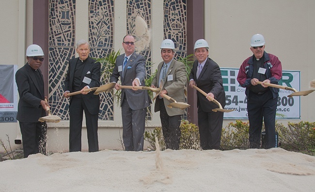 Breaking ground for the addition, from left: St. Henry's pastor, Father Francis Akwue; pastor emeritus, Msgr. James Reynolds; Pompano Beach Mayor Lamar Fisher; David Prada, senior director of Building and Construction for the archdiocese; Brian Herbert, of Gallo Herbert Architects; and Msgr. John Glorie, a retired archdiocesan priest.