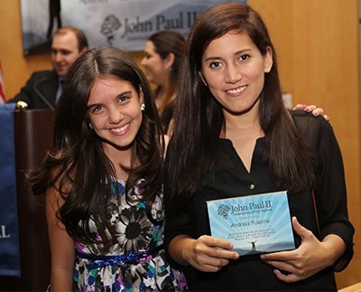 Lilimar Hernandez, left, principal actress in the film "Pedro Pan," poses with its writer and director, Andrea Puente, who won the Reel Rose Award for Best Short Screenplay.