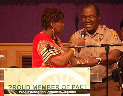 J.D. Patterson, director of the Miami-Dade Police Department, answers a question from Myra Solomon of the Universal Truth Center in Miami Gardens.