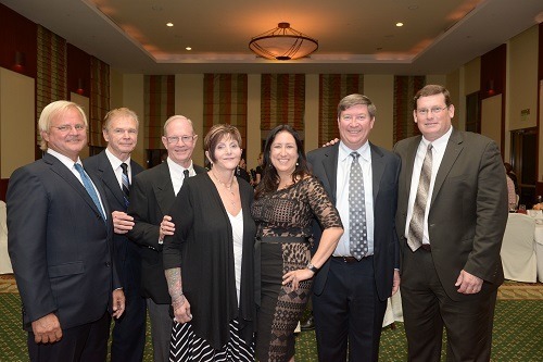 Six of Archbishop Curley Notre Dame's seven 2014 Hall of Fame inductees are pictured here with Douglas Romanik ‘84, far right, the school's principal. From left: James Kushlan ’65; Larry Wilson ’58; Tom Laubenthal '68; Camille Martone Geraldi ’66; Merrill Romanik ’83; David Gerrits ’78.