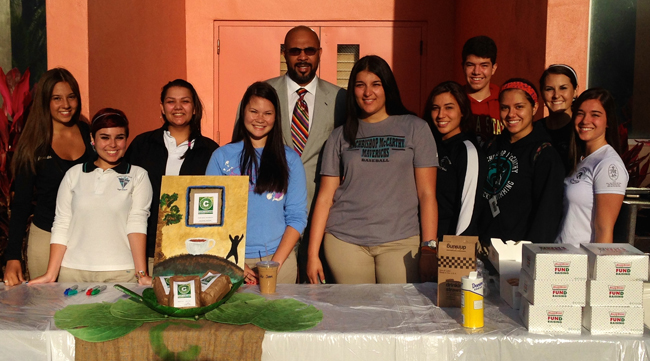 McCarthy's social entrepreneurship students with Principal Richard Jean at the school's iced Café Cocano sale.