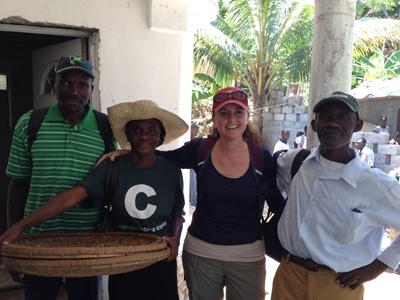 Archbishop McCarthy social entrepreneurship teacher Kim Zocco poses with members of the Café Cocano cooperative in Port de Paix, Haiti.