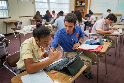 The One to One Learning Program allows students more time to use classroom time to work in small groups or interact one on one with a teacher. Jennifer Lamy (left) and Daniel Briz (right) discuss their experience with the new program in the informational video.