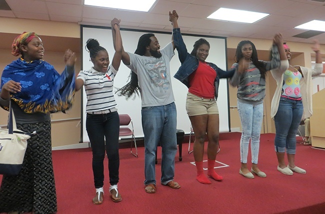 MetroTown delegates perform a skit based on their Caribbean culture.