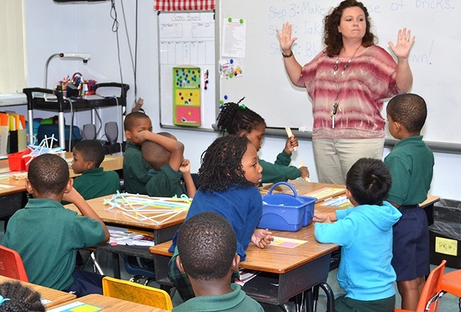 Sheila Pamplin calls her first-grade class to order.