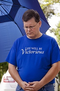 Todd Mackiewicz, parishioner from St. Elizabeth Ann Seton Church in Coral Springs, prays during the National Day of Remembrance for aborted children.