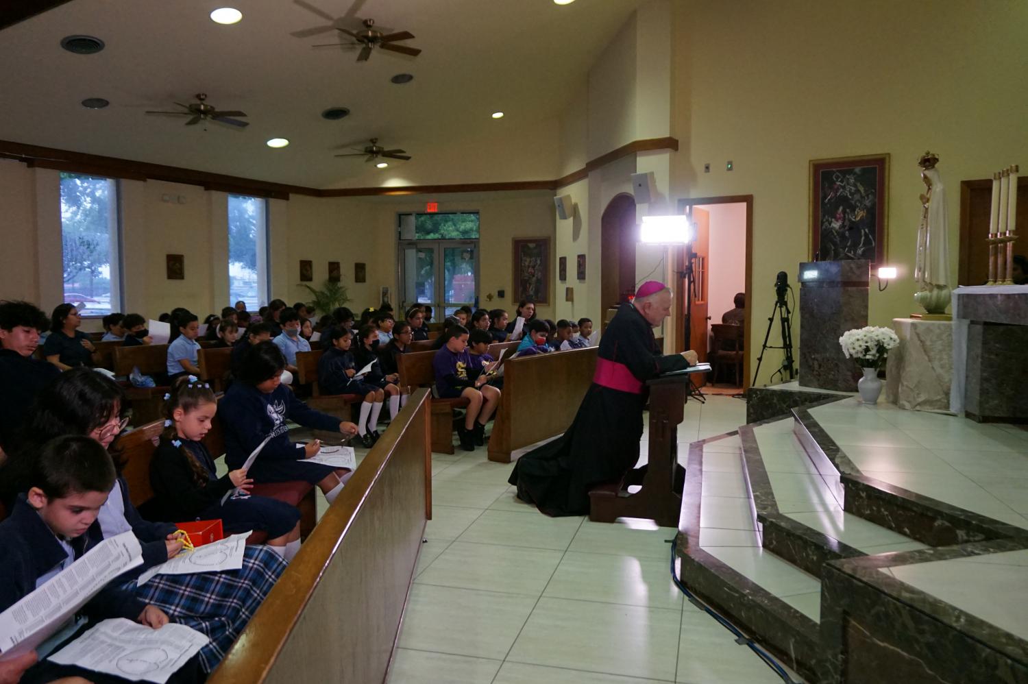 adom-st-michael-school-students-pray-the-rosary-with-archbishop-wenski